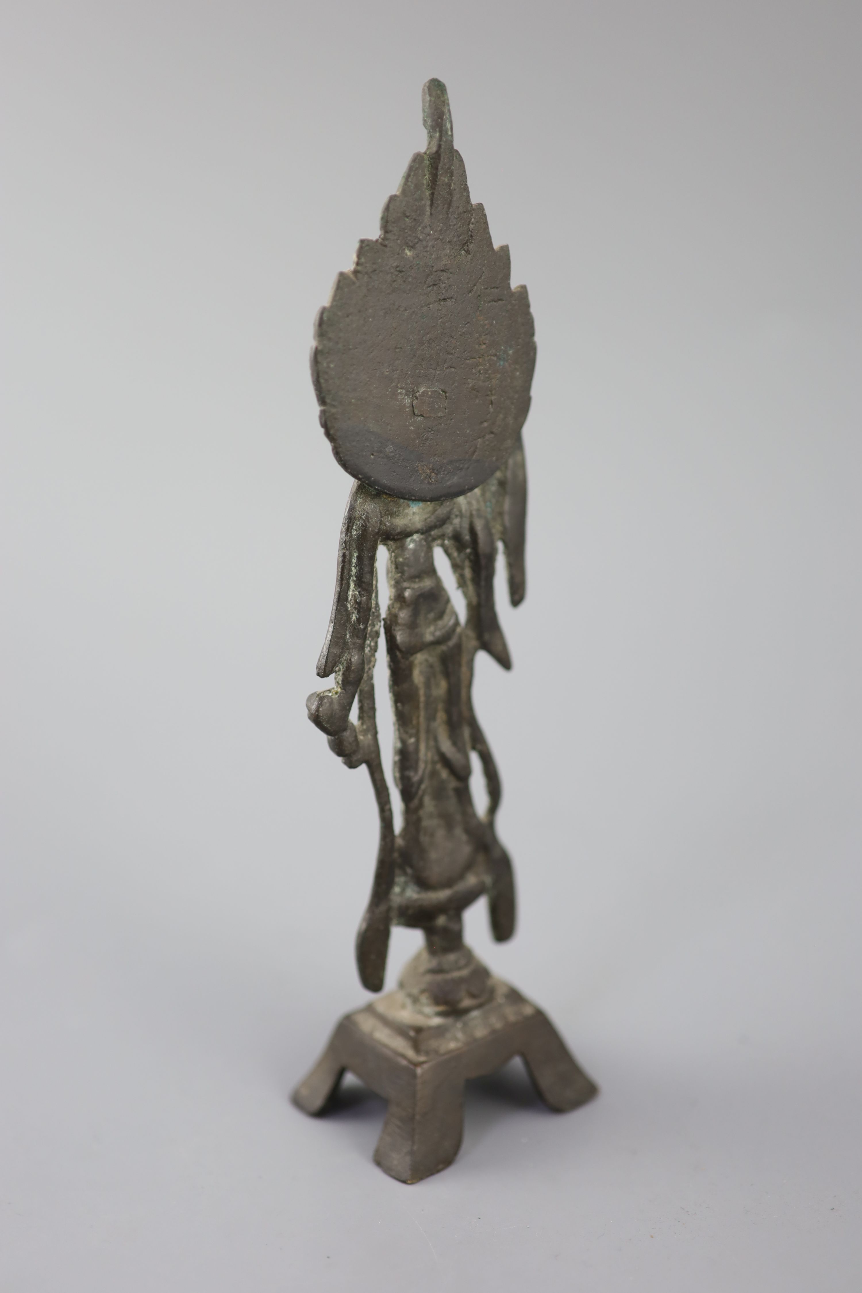 A Chinese bronze figure of a Bodhisattva, Tang style, 22.5cm high, neck repaired, Provenance - A. T. Arber-Cooke